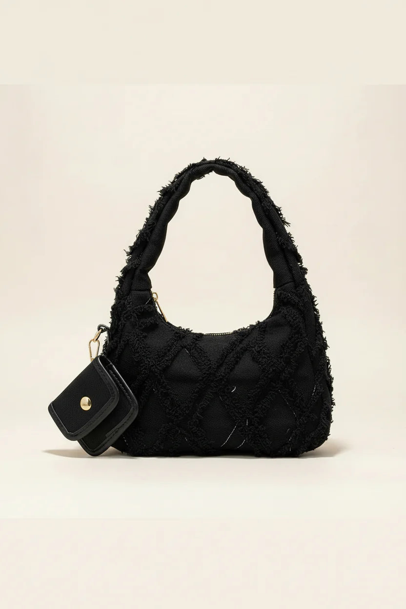 sac noir style effilochee brodee 